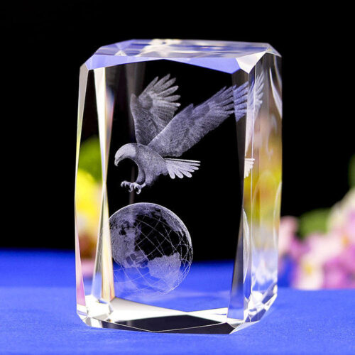 Diamond crystal block with engraved eagle and globe design for laser engraving and personalized crystal gift projects.